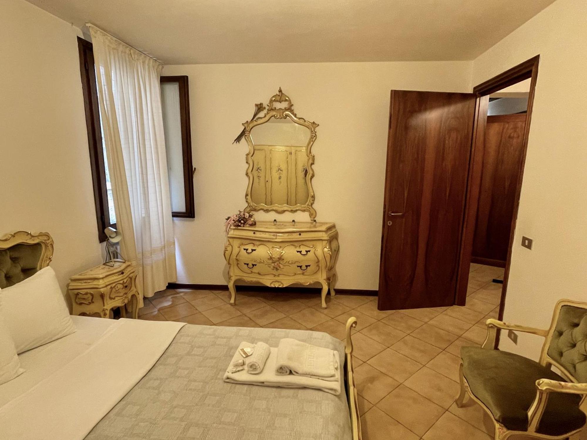 Апартаменты Palazzo Bianchetti Тревизо Номер фото
